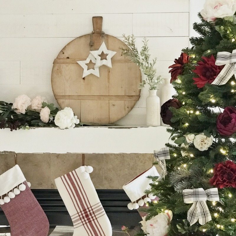 Christmas Mantel Disply with stockings and floral accents