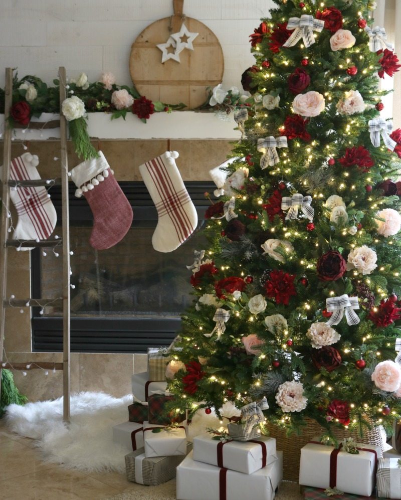 Holiday Tree Decor with stockings and floral tree