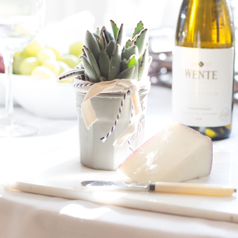 stress-free hostess with cheeseboard and wines
