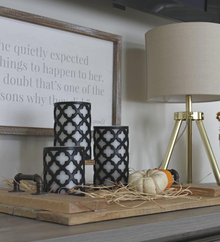 chic affordable home decor with candle holders and fall pumpkins
