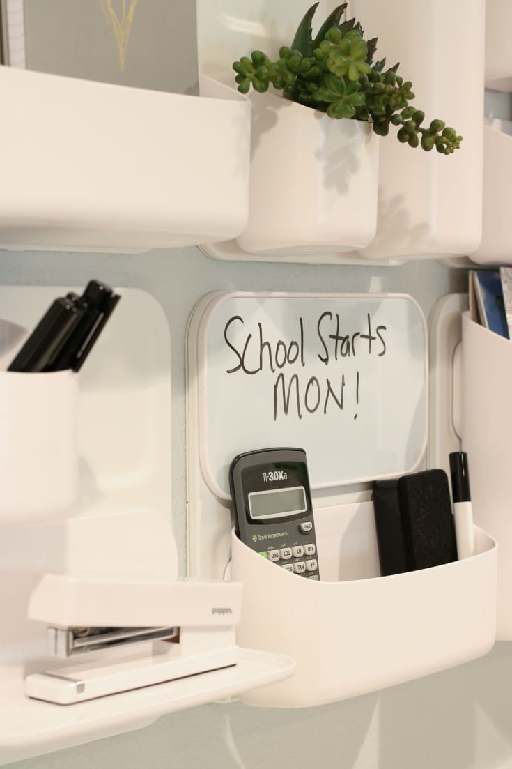 organized wall storage system for homework supplies