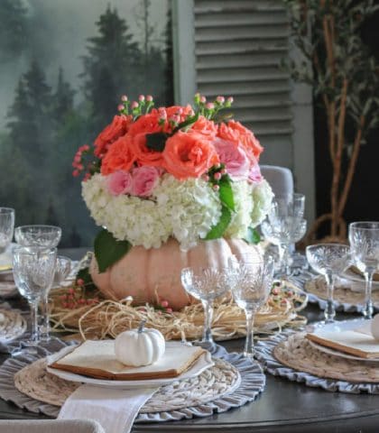 easy DIY pumpkin floral vase center piece in dining room