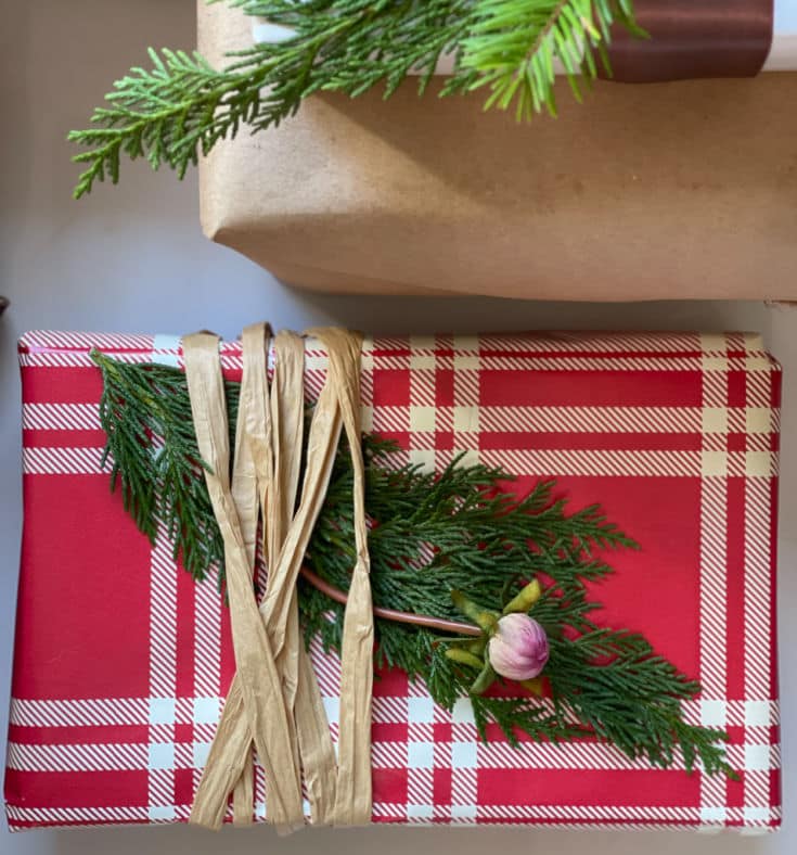 Gift wrapping for Christmas adds personal touch to presents with easy additions like evergreen sprigs