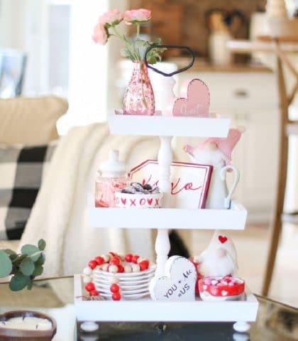 white wood tiered tray holds fun festive holiday decor as easy way to display