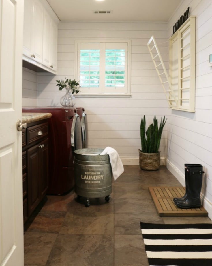 Laundry room makeover with painted cabinets and old tile floors before stencil project