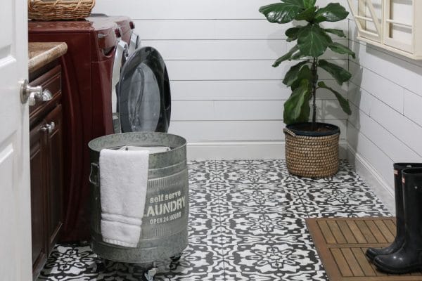 Black and white Stencils created new floors on a budget and finished laundry room makeover