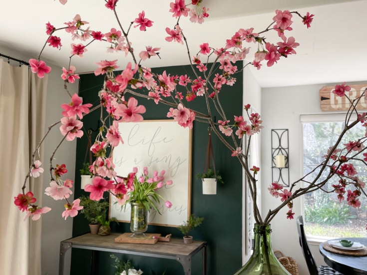DIY spring branches made with faux blossoms and real branches